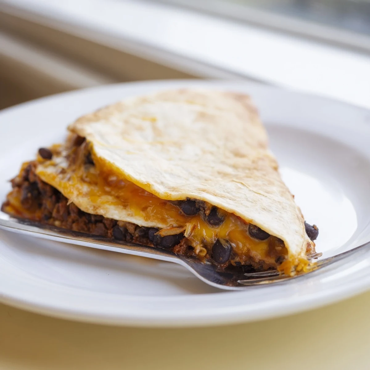 A delicious Tex-Mex tortilla wrap hack, filled with flavorful beans and ready to serve.