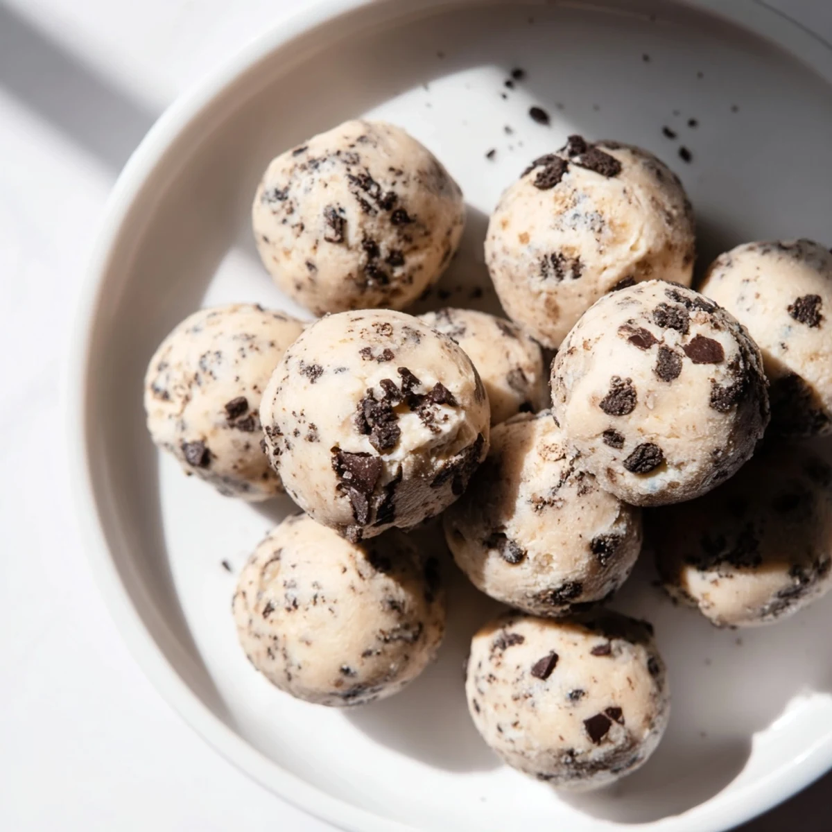 These Cream Cheese Oreo Protein Balls offer sweet, cookie-like flavors in a quick, healthy, no-bake treat.