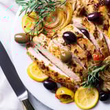 Fragrant Rosemary Garlic Roasted Chicken with Olives: golden skin, savory herbs in every bite.