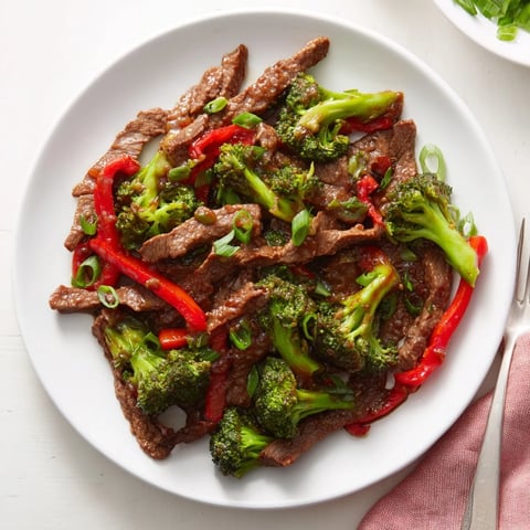 Quick Beef and Broccoli Stir-Fry with tender beef and vibrant greens on a plate.  