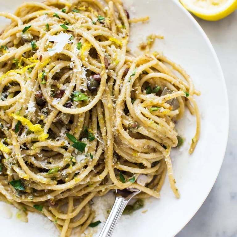 Delicious lemon thyme olive tapenade pasta with al dente noodles and rich flavors.