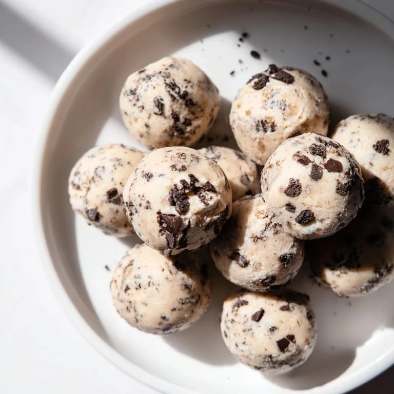 These Cream Cheese Oreo Protein Balls offer sweet, cookie-like flavors in a quick, healthy, no-bake treat.