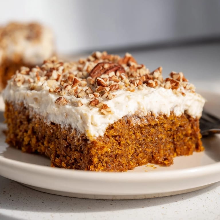 Beautiful, golden Pumpkin Bars with brown sugar frosting, inviting everyone to enjoy a treat.