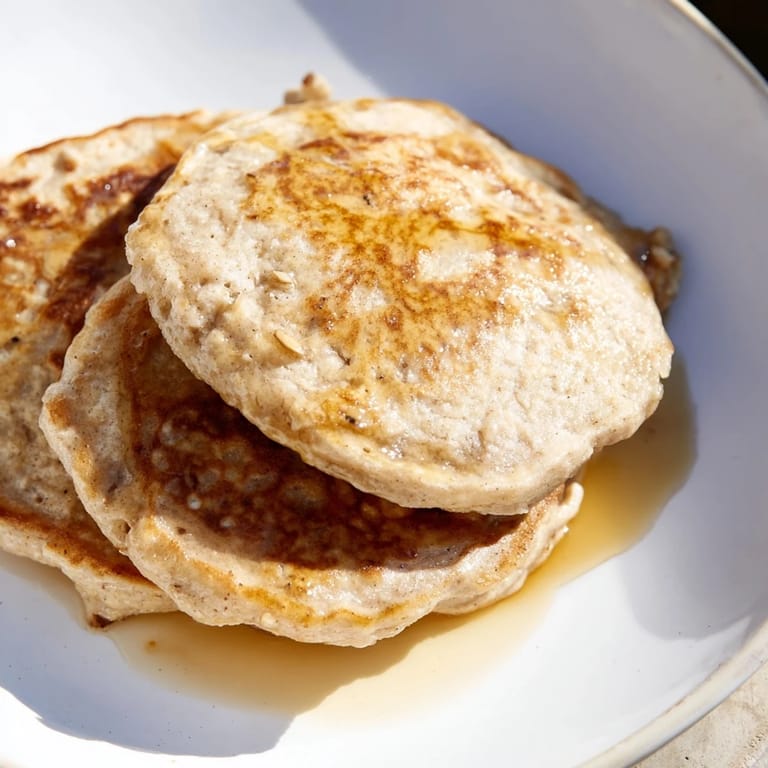 Freshly cooked banana oat pancakes, showcasing the naturally sweet flavor of bananas and oats.