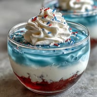 Festive 4th of July Firecracker Jello Shots for a sweet, fruity Independence Day treat.