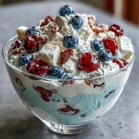 Red White Blue Berry Trifle: A majestic cascade of cake, berries, and fluffy cream.